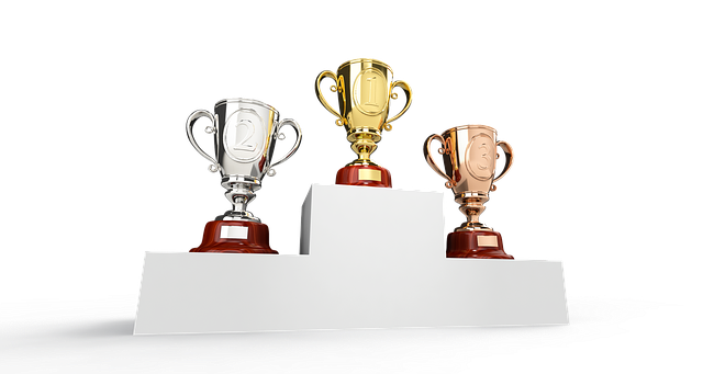 Three trophies on podium