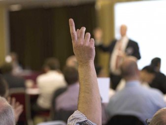 Raised hand to ask question