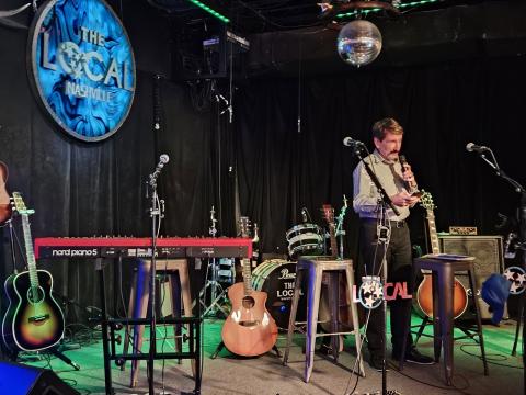 Bruce Wawrzyniak on stage in Nashville hosting a showcase Bruce Wawrzyniak on stage in Nashville hosting a showcase