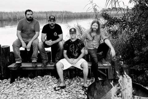 Black and white outdoor picture of The Apalachicola Sound band