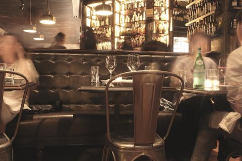 A lounge setting with blurred faces A lounge setting with blurred faces